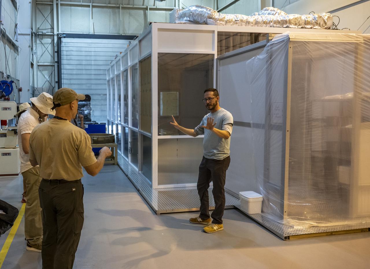 Recovery teams participate in clean room tours and rehearsals in preparation for the retrieval of the sample return capsule from NASA's OSIRIS-REx mission, Monday, July 17, 2023, at the Department of Defense's Utah Test and Training Range. The sample was collected from the asteroid Bennu in October 2020 by NASA’s OSIRIS-REx spacecraft and will return to Earth on September 24th, landing under parachute at the Utah Test and Training Range. Photo Credit: (NASA/Keegan Barber)