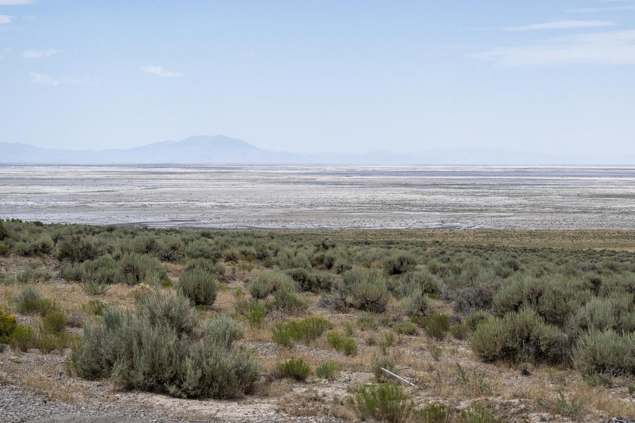 The Department of Defense's Utah Test and Training Range is seen, Monday, July 17, 2023, as recovery teams tour the projected landing ellipse in preparation for the retrieval of the sample return capsule from NASA's OSIRIS-REx mission. The sample was collected from the asteroid Bennu in October 2020 by NASA’s OSIRIS-REx spacecraft and will return to Earth on September 24th, landing under parachute at the Utah Test and Training Range. Photo Credit: (NASA/Keegan Barber)
