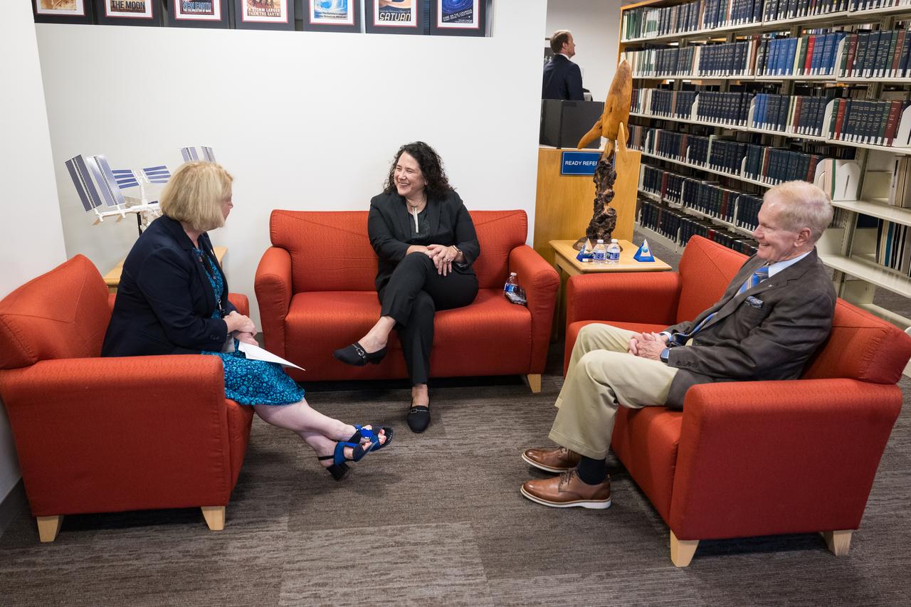 Isabella Casillas Guzman, Administrator of the Small Business Administration (SBA), center, speaks with NASA Deputy Administrator Pam Melroy, left, and NASA Administrator Bill Nelson, right, before unveiling the 2022 Small Business Federal Procurement Scorecard, at an event hosted by NASA, Tuesday, July 18, 2023 in the Earth Information Center at the Mary W. Jackson NASA Headquarters building in Washington. For the sixth year in a row NASA has received an “A” rating from SBA for its work with small businesses. Photo Credit: (NASA/Aubrey Gemignani)
