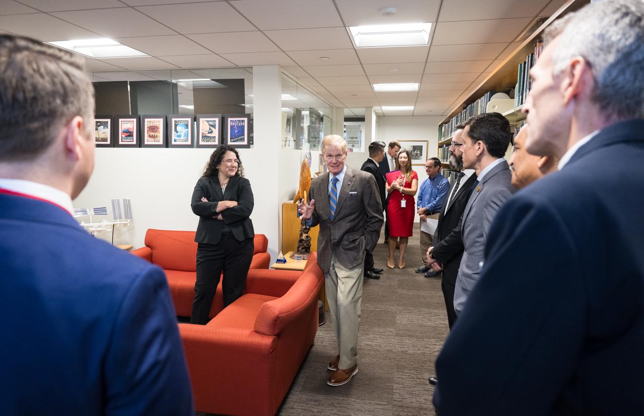 NASA Administrator Bill Nelson, center, and Isabella Casillas Guzman, Administrator of the Small Business Administration (SBA), left, speak to small business owners who work with NASA, before Guzman unveiled the 2022 Small Business Federal Procurement Scorecard, at an event hosted by NASA, Tuesday, July 18, 2023 in the Earth Information Center at the Mary W. Jackson NASA Headquarters building in Washington. For the sixth year in a row NASA has received an “A” rating from SBA for its work with small businesses. Photo Credit: (NASA/Aubrey Gemignani)
