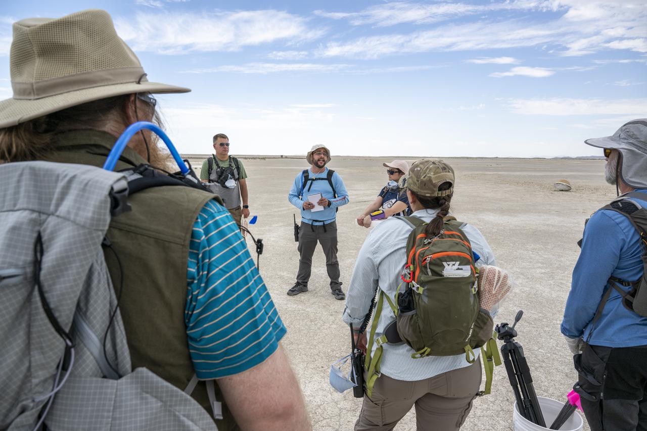 Recovery teams participate in field rehearsals in preparation for the retrieval of the sample return capsule from NASA's OSIRIS-REx mission, Tuesday, July 18, 2023, at the Department of Defense's Utah Test and Training Range. The sample was collected from the asteroid Bennu in October 2020 by NASA’s OSIRIS-REx spacecraft and will return to Earth on September 24th, landing under parachute at the Utah Test and Training Range. Photo Credit: (NASA/Keegan Barber)