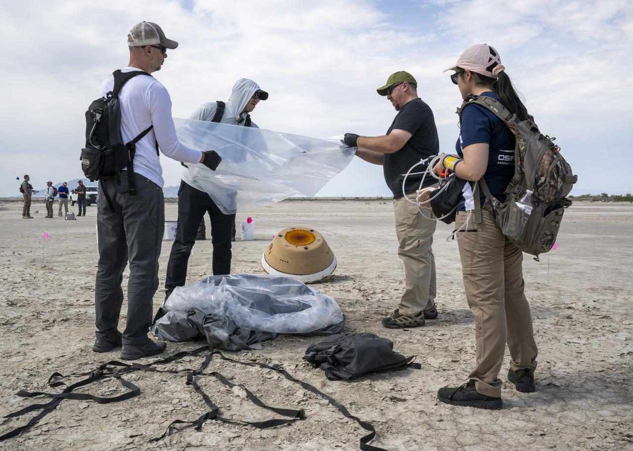 Recovery teams participate in field rehearsals in preparation for the retrieval of the sample return capsule from NASA's OSIRIS-REx mission, Tuesday, July 18, 2023, at the Department of Defense's Utah Test and Training Range. The sample was collected from the asteroid Bennu in October 2020 by NASA’s OSIRIS-REx spacecraft and will return to Earth on September 24th, landing under parachute at the Utah Test and Training Range. Photo Credit: (NASA/Keegan Barber)