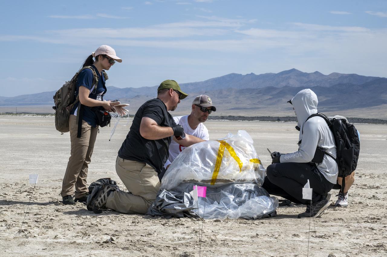 Recovery teams participate in field rehearsals in preparation for the retrieval of the sample return capsule from NASA's OSIRIS-REx mission, Tuesday, July 18, 2023, at the Department of Defense's Utah Test and Training Range. The sample was collected from the asteroid Bennu in October 2020 by NASA’s OSIRIS-REx spacecraft and will return to Earth on September 24th, landing under parachute at the Utah Test and Training Range. Photo Credit: (NASA/Keegan Barber)