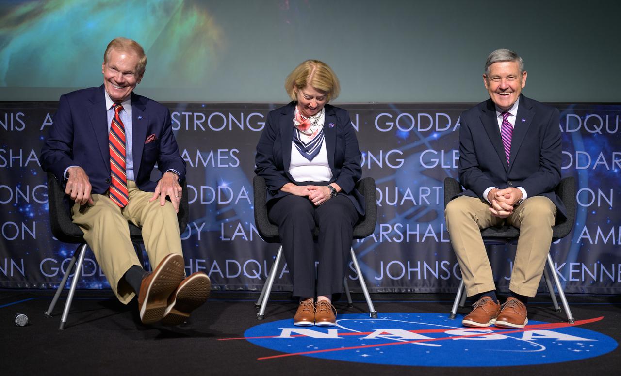 NASA Administrator Bill Nelson, left, NASA Deputy Administrator Pam Melroy, and NASA Associate Administrator Bob Cabana, right, laugh about having worn similar shoes at the start of a NASA town hall event, Wednesday, July 19, 2023, at the NASA Headquarters Mary W. Jackson Building in Washington. Photo Credit: (NASA/Bill Ingalls)