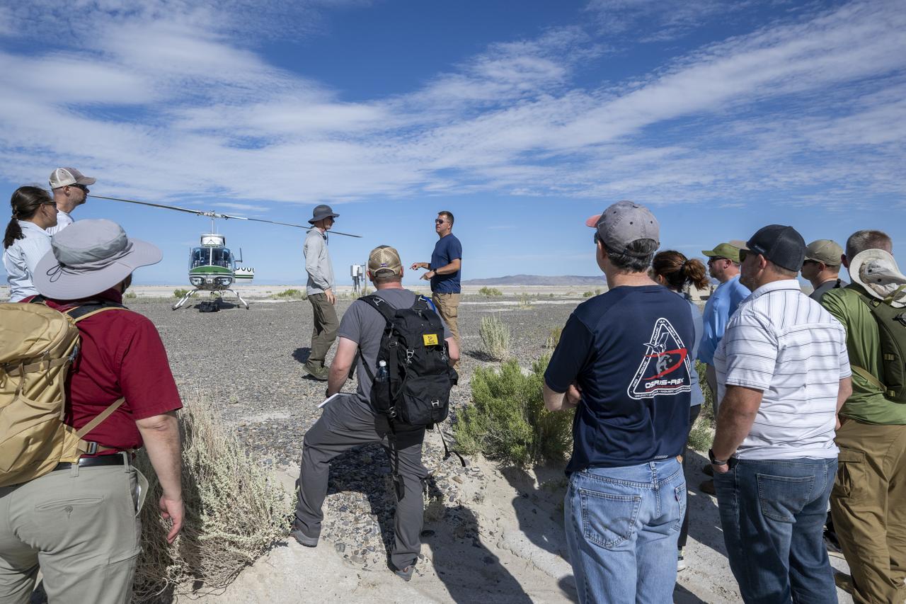 Recovery teams participate in helicopter training in preparation for the retrieval of the sample return capsule from NASA's OSIRIS-REx mission, Wednesday, July 19, 2023, at the Department of Defense's Utah Test and Training Range. The sample was collected from the asteroid Bennu in October 2020 by NASA’s OSIRIS-REx spacecraft and will return to Earth on September 24th, landing under parachute at the Utah Test and Training Range. Photo Credit: (NASA/Keegan Barber)