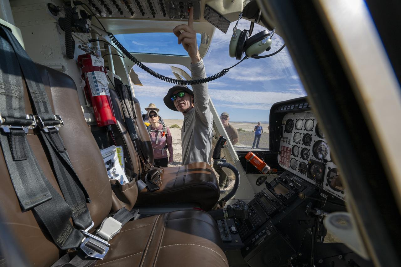 Recovery teams participate in helicopter training in preparation for the retrieval of the sample return capsule from NASA's OSIRIS-REx mission, Wednesday, July 19, 2023, at the Department of Defense's Utah Test and Training Range. The sample was collected from the asteroid Bennu in October 2020 by NASA’s OSIRIS-REx spacecraft and will return to Earth on September 24th, landing under parachute at the Utah Test and Training Range. Photo Credit: (NASA/Keegan Barber)