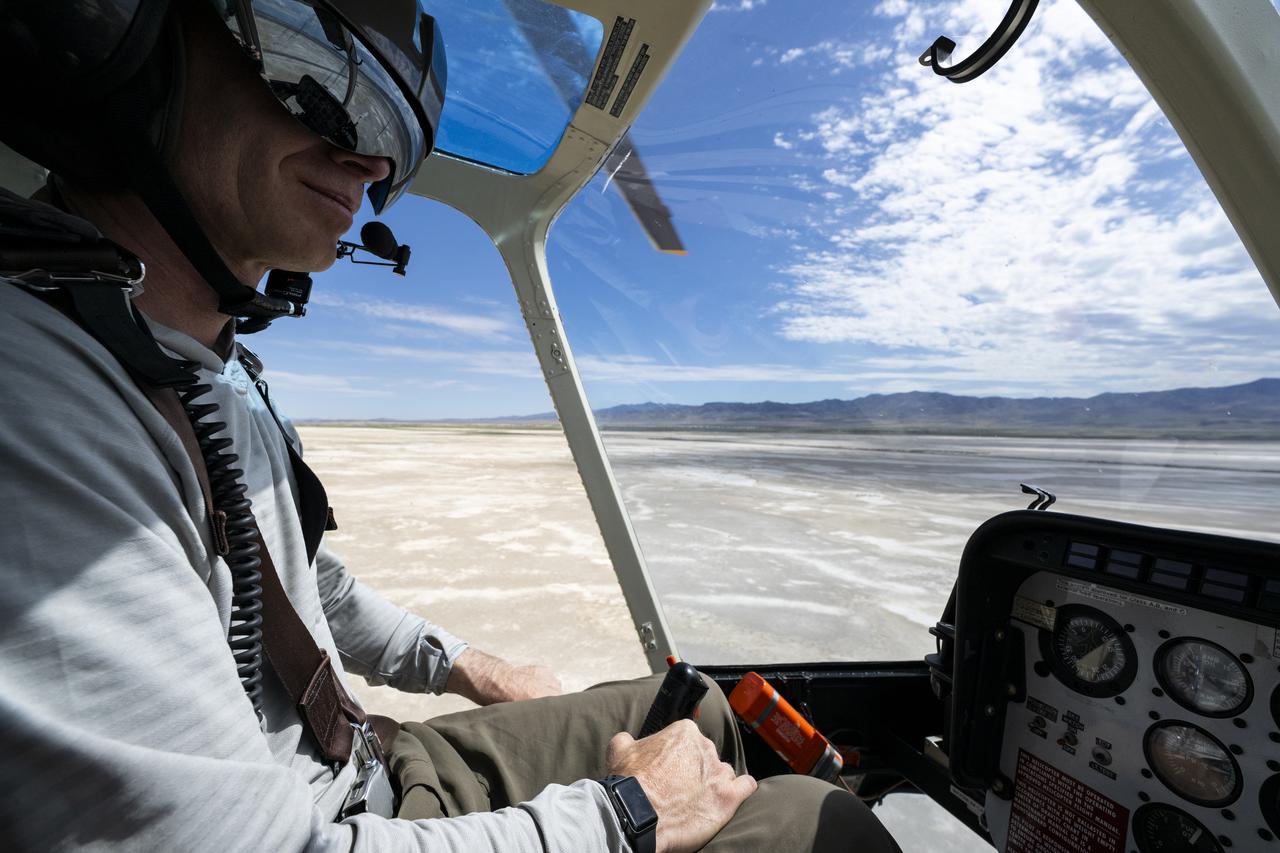 The Department of Defense's Utah Test and Training Range is seen from the cockpit of a helicopter, Wednesday, July 19, 2023, as recovery teams participate in helicopter training in preparation for the retrieval of the sample return capsule from NASA's OSIRIS-REx mission. The sample was collected from the asteroid Bennu in October 2020 by NASA’s OSIRIS-REx spacecraft and will return to Earth on September 24th, landing under parachute at the Utah Test and Training Range. Photo Credit: (NASA/Keegan Barber)
