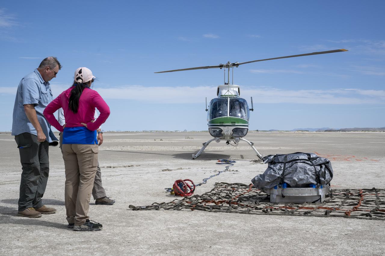 Recovery teams participate in helicopter training in preparation for the retrieval of the sample return capsule from NASA's OSIRIS-REx mission, Wednesday, July 19, 2023, at the Department of Defense's Utah Test and Training Range. The sample was collected from the asteroid Bennu in October 2020 by NASA’s OSIRIS-REx spacecraft and will return to Earth on September 24th, landing under parachute at the Utah Test and Training Range. Photo Credit: (NASA/Keegan Barber)