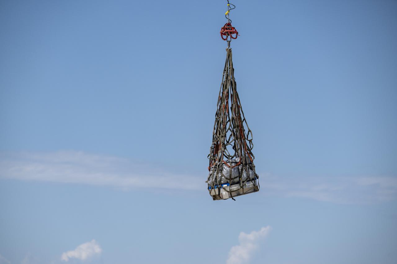 Recovery teams participate in helicopter training in preparation for the retrieval of the sample return capsule from NASA's OSIRIS-REx mission, Wednesday, July 19, 2023, at the Department of Defense's Utah Test and Training Range. The sample was collected from the asteroid Bennu in October 2020 by NASA’s OSIRIS-REx spacecraft and will return to Earth on September 24th, landing under parachute at the Utah Test and Training Range. Photo Credit: (NASA/Keegan Barber)