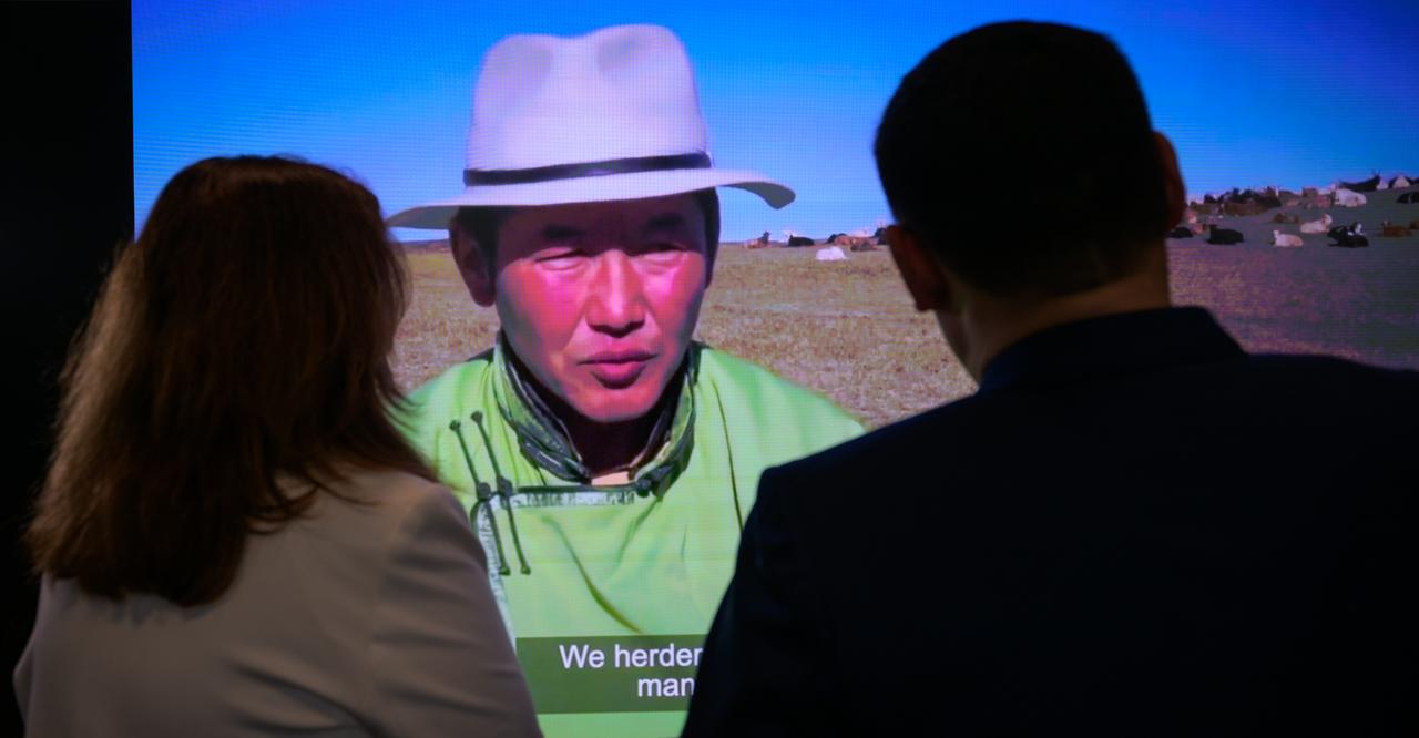 NASA Earth Science Division Director Karen St. Germain, left, talks with Prime Minister Oyun-Erdene Luvsannamsrai of Mongolia, as they tour NASA’s Earth Information Center, Friday, Aug. 4, 2023, at the NASA Headquarters Mary W. Jackson Building in Washington. The Earth Information Center is a new immersive experience that combines live data sets with cutting-edge data visualization to show NASA data can improve lives in the face of disasters, environmental challenges, and our changing world. Photo Credit: (NASA/Bill Ingalls)