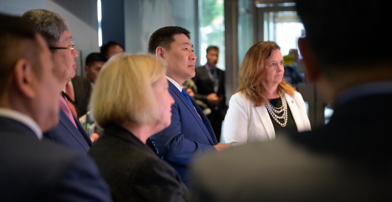 NASA Earth Science Division Director Karen St. Germain, far right, talks with Prime Minister Oyun-Erdene Luvsannamsrai of Mongolia, as they along with NASA Deputy Administrator Pam Melroy, left, tour NASA’s Earth Information Center, Friday, Aug. 4, 2023, at the NASA Headquarters Mary W. Jackson Building in Washington. The Earth Information Center is a new immersive experience that combines live data sets with cutting-edge data visualization to show NASA data can improve lives in the face of disasters, environmental challenges, and our changing world. Photo Credit: (NASA/Bill Ingalls)