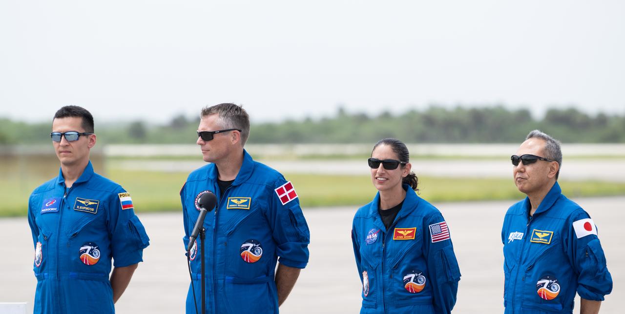 Roscosmos cosmonaut Konstantin Borisov, left, ESA (European Space Agency) astronaut Andreas Mogensen, second from left, NASA astronaut Jasmin Moghbeli, second from right, and Japan Aerospace Exploration Agency (JAXA) astronaut Satoshi Furukawa, right, are seen after arriving at the Launch and Landing Facility at NASA’s Kennedy Space Center in Florida ahead of the agency’s SpaceX Crew-7 mission, Sunday, Aug. 20, 2023. NASA’s SpaceX Crew-7 mission is the seventh crew rotation mission of the SpaceX Dragon spacecraft and Falcon 9 rocket to the International Space Station as part of the agency’s Commercial Crew Program. Moghbeli, Mogensen, Furukawa, and Borisov are scheduled to launch at 3:49 a.m. EDT on August 25, from Launch Complex 39A at the Kennedy Space Center. Photo Credit: (NASA/Joel Kowsky)