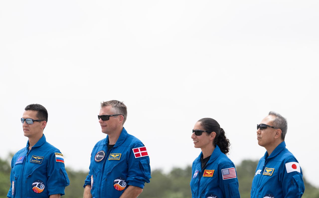Roscosmos cosmonaut Konstantin Borisov, left, ESA (European Space Agency) astronaut Andreas Mogensen, second from left, NASA astronaut Jasmin Moghbeli, second from right, and Japan Aerospace Exploration Agency (JAXA) astronaut Satoshi Furukawa right, are seen after arriving at the Launch and Landing Facility at NASA’s Kennedy Space Center in Florida ahead of the agency’s SpaceX Crew-7 mission, Sunday, Aug. 20, 2023. NASA’s SpaceX Crew-7 mission is the seventh crew rotation mission of the SpaceX Dragon spacecraft and Falcon 9 rocket to the International Space Station as part of the agency’s Commercial Crew Program. Moghbeli, Mogensen, Furukawa, and Borisov are scheduled to launch at 3:49 a.m. EDT on August 25, from Launch Complex 39A at the Kennedy Space Center. Photo Credit: (NASA/Joel Kowsky)