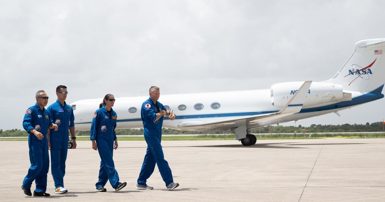Japan Aerospace Exploration Agency (JAXA) astronaut Satoshi Furukawa, left, Roscosmos cosmonaut Konstantin Borisov, NASA astronaut Jasmin Moghbeli, and ESA (European Space Agency) astronaut Andreas Mogensen are seen as they depart the Launch and Landing Facility at NASA’s Kennedy Space Center in Florida ahead of the agency’s SpaceX Crew-7 mission, Sunday, Aug. 20, 2023. NASA’s SpaceX Crew-7 mission is the seventh crew rotation mission of the SpaceX Dragon spacecraft and Falcon 9 rocket to the International Space Station as part of the agency’s Commercial Crew Program. Moghbeli, Mogensen, Furukawa, and Borisov are scheduled to launch at 3:49 a.m. EDT on August 25, from Launch Complex 39A at the Kennedy Space Center. Photo Credit: (NASA/Joel Kowsky)