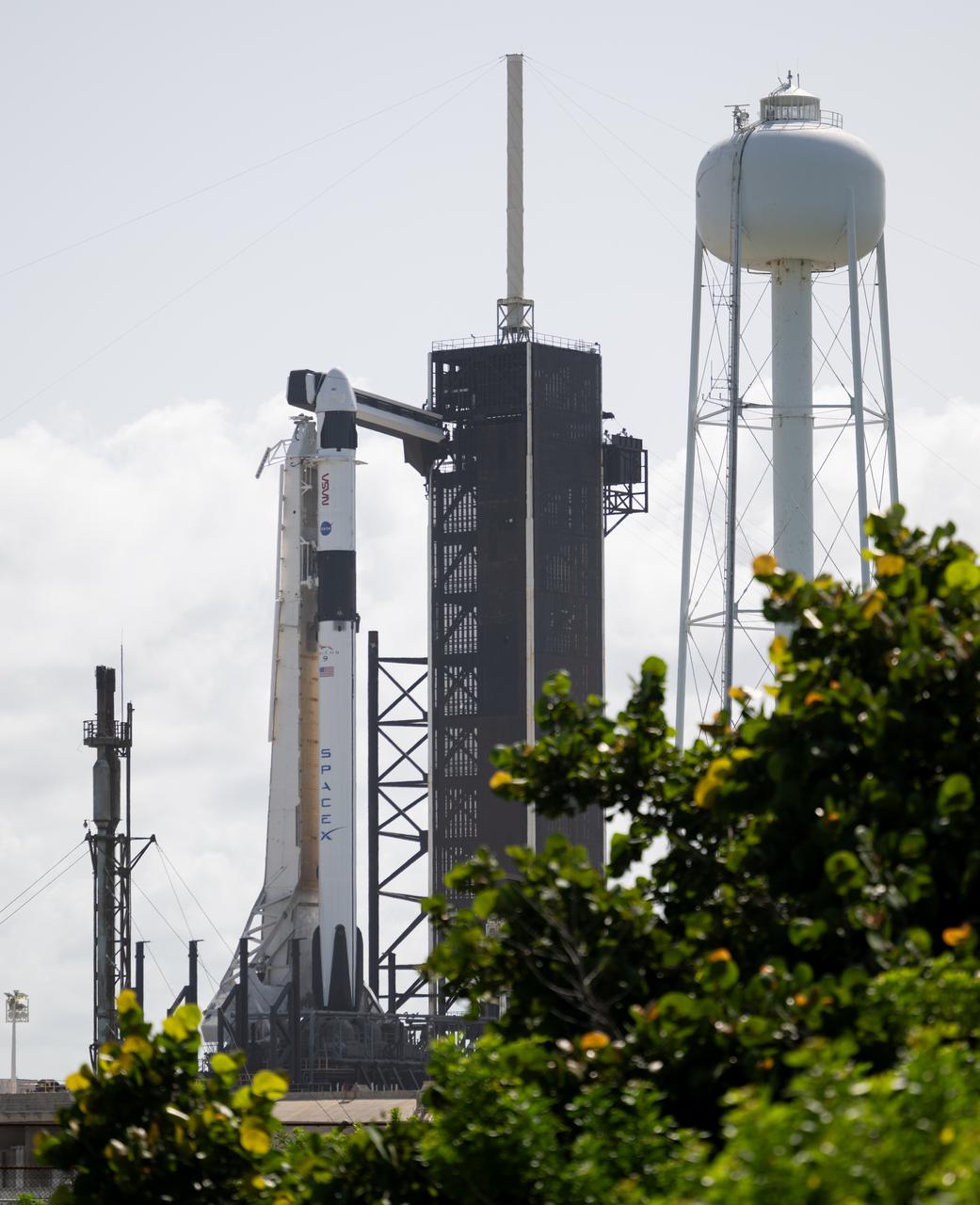 A SpaceX Falcon 9 rocket with the company's Dragon spacecraft on top is seen on the launch pad at Launch Complex 39A as preparations continue for the Crew-7 mission, Monday, Aug. 21, 2023, at NASA’s Kennedy Space Center in Florida. NASA’s SpaceX Crew-7 mission is the seventh crew rotation mission of the SpaceX Crew Dragon spacecraft and Falcon 9 rocket to the International Space Station as part of the agency’s Commercial Crew Program. NASA astronaut Jasmin Moghbeli, ESA (European Space Agency) astronaut Andreas Mogensen, Japan Aerospace Exploration Agency (JAXA) astronaut Satoshi Furukawa, and Roscosmos cosmonaut Konstantin Borisov are scheduled to launch at 3:49 a.m. EDT on Friday, August 25, from Launch Complex 39A at the Kennedy Space Center. Photo Credit: (NASA/Joel Kowsky)