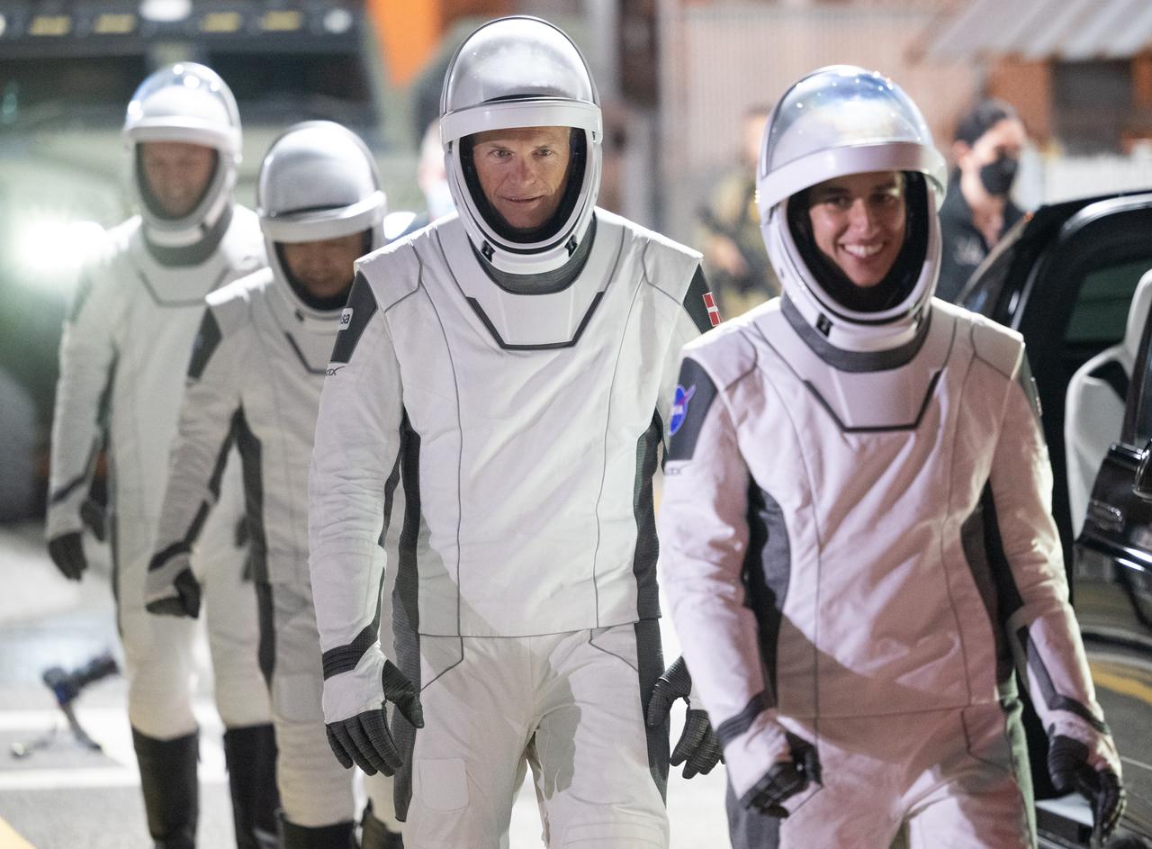 NASA astronaut Jasmin Moghbeli, ESA (European Space Agency) astronaut Andreas Mogensen, Japan Aerospace Exploration Agency (JAXA) astronaut Satoshi Furukawa, and Roscosmos cosmonaut Konstantin Borisov, wearing SpaceX spacesuits, are seen as they prepare to depart the Neil  A. Armstrong Operations and Checkout Building for Launch Complex 39A during a dress rehearsal prior to the Crew-7 mission launch, Tuesday, Aug. 22, 2023, at NASA’s Kennedy Space Center in Florida. NASA’s SpaceX Crew-7 mission is the seventh crew rotation mission of the SpaceX Dragon spacecraft and Falcon 9 rocket to the International Space Station as part of the agency’s Commercial Crew Program. Moghbeli, Mogensen, Furukawa, and Borisov are scheduled to launch at 3:49 a.m. EDT on August 25, from Launch Complex 39A at the Kennedy Space Center. Photo Credit: (NASA/Joel Kowsky)