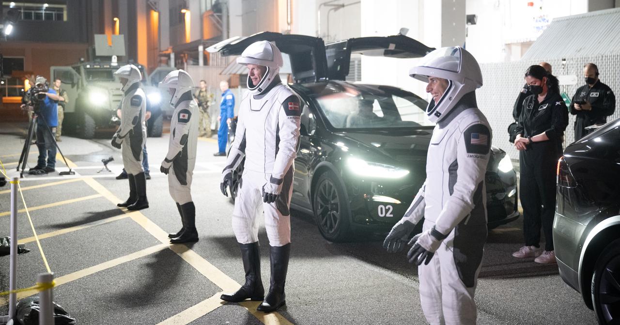 NASA astronaut Jasmin Moghbeli, right, ESA (European Space Agency) astronaut Andreas Mogensen, Japan Aerospace Exploration Agency (JAXA) astronaut Satoshi Furukawa, and Roscosmos cosmonaut Konstantin Borisov, wearing SpaceX spacesuits, are seen as they prepare to depart the Neil  A. Armstrong Operations and Checkout Building for Launch Complex 39A during a dress rehearsal prior to the Crew-7 mission launch, Tuesday, Aug. 22, 2023, at NASA’s Kennedy Space Center in Florida. NASA’s SpaceX Crew-7 mission is the seventh crew rotation mission of the SpaceX Dragon spacecraft and Falcon 9 rocket to the International Space Station as part of the agency’s Commercial Crew Program. Moghbeli, Mogensen, Furukawa, and Borisov are scheduled to launch at 3:49 a.m. EDT on Friday, August 25, from Launch Complex 39A at the Kennedy Space Center. Photo Credit: (NASA/Joel Kowsky)