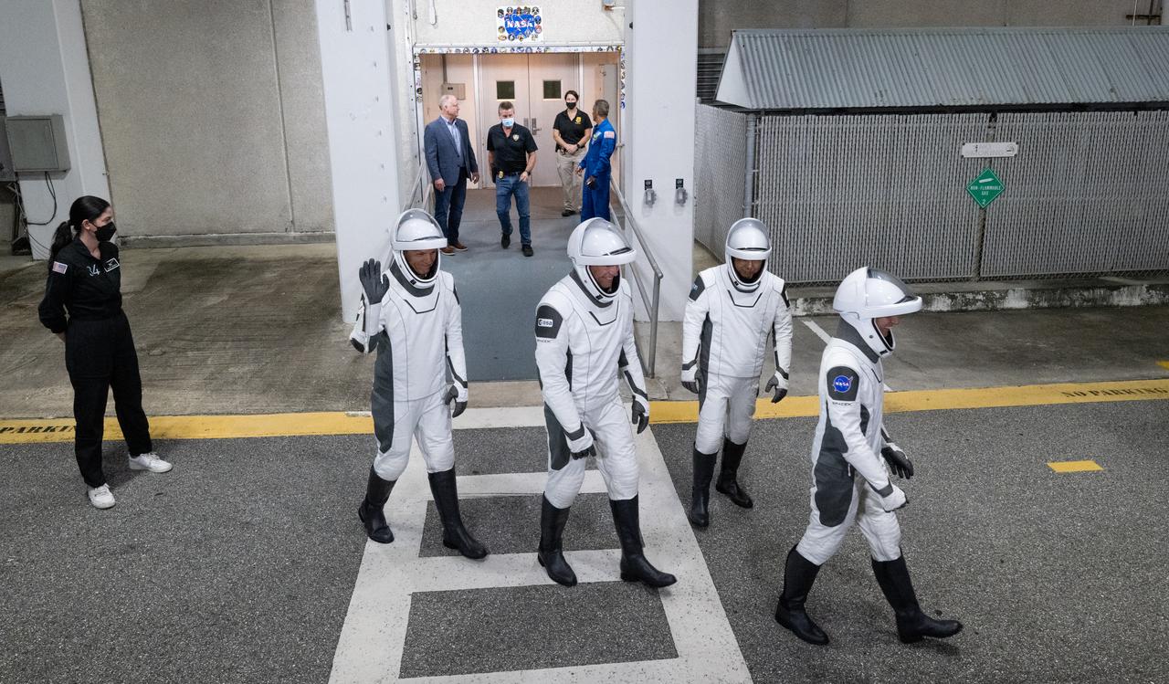 NASA astronaut Jasmin Moghbeli, right, Japan Aerospace Exploration Agency (JAXA) astronaut Satoshi Furukawa, ESA (European Space Agency) astronaut Andreas Mogensen, and Roscosmos cosmonaut Konstantin Borisov, wearing SpaceX spacesuits, are seen as they prepare to depart the Neil  A. Armstrong Operations and Checkout Building for Launch Complex 39A during a dress rehearsal prior to the Crew-7 mission launch, Tuesday, Aug. 22, 2023, at NASA’s Kennedy Space Center in Florida. NASA’s SpaceX Crew-7 mission is the seventh crew rotation mission of the SpaceX Dragon spacecraft and Falcon 9 rocket to the International Space Station as part of the agency’s Commercial Crew Program. Moghbeli, Mogensen, Furukawa, and Borisov are scheduled to launch at 3:49 a.m. EDT on Friday, August 25, from Launch Complex 39A at the Kennedy Space Center. Photo Credit: (NASA/Joel Kowsky)