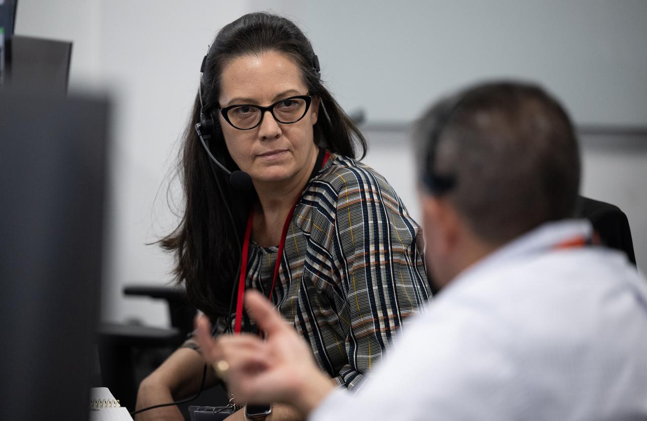 Emily Nelson, NASA's chief flight director, speaks with Richard Jones, manager of the Mission Management and Integration Office for NASA's Commercial Crew Program, as they monitor the countdown during a dress rehearsal in preparation for the launch of a SpaceX Falcon 9 rocket carrying the company's Dragon spacecraft on NASA’s SpaceX Crew-7 mission with NASA astronaut Jasmin Moghbeli, ESA (European Space Agency) astronaut Andreas Mogensen, Japan Aerospace Exploration Agency (JAXA) astronaut Satoshi Furukawa, and Roscosmos cosmonaut Konstantin Borisov onboard, Tuesday, Aug. 22, 2023, in SpaceX’s SpaceX’s Launch and Landing Control Center in HangerX at NASA’s Kennedy Space Center in Florida. NASA’s SpaceX Crew-7 mission is the seventh crew rotation mission of the SpaceX Dragon spacecraft and Falcon 9 rocket to the International Space Station as part of the agency’s Commercial Crew Program. Moghbeli, Mogensen, Furukawa, and Borisov are scheduled to launch on 3:49 a.m. EDT on Friday, August 25, from Launch Complex 39A at the Kennedy Space Center. Photo Credit: (NASA/Joel Kowsky)