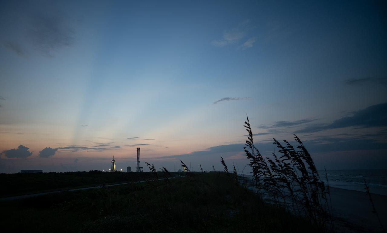 A SpaceX Falcon 9 rocket with the company's Dragon spacecraft on top is seen after sunset on the launch pad at Launch Complex 39A as preparations continue for the Crew-7 mission, Wednesday, Aug. 23, 2023, at NASA’s Kennedy Space Center in Florida. NASA’s SpaceX Crew-7 mission is the seventh crew rotation mission of the SpaceX Crew Dragon spacecraft and Falcon 9 rocket to the International Space Station as part of the agency’s Commercial Crew Program. NASA astronaut Jasmin Moghbeli, ESA (European Space Agency) astronaut Andreas Mogensen, Japan Aerospace Exploration Agency (JAXA) astronaut Satoshi Furukawa, and Roscosmos cosmonaut Konstantin Borisov are scheduled to launch at 3:50 a.m. EDT on Friday, August 25, from Launch Complex 39A at the Kennedy Space Center. Photo Credit: (NASA/Joel Kowsky)