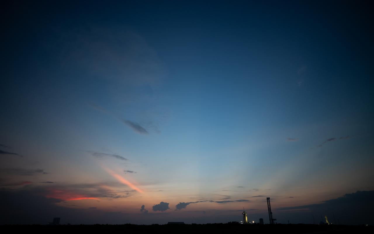 A SpaceX Falcon 9 rocket with the company's Dragon spacecraft on top is seen after sunset on the launch pad at Launch Complex 39A as preparations continue for the Crew-7 mission, Wednesday, Aug. 23, 2023, at NASA’s Kennedy Space Center in Florida. NASA’s SpaceX Crew-7 mission is the seventh crew rotation mission of the SpaceX Crew Dragon spacecraft and Falcon 9 rocket to the International Space Station as part of the agency’s Commercial Crew Program. NASA astronaut Jasmin Moghbeli, ESA (European Space Agency) astronaut Andreas Mogensen, Japan Aerospace Exploration Agency (JAXA) astronaut Satoshi Furukawa, and Roscosmos cosmonaut Konstantin Borisov are scheduled to launch at 3:50 a.m. EDT on Friday, August 25, from Launch Complex 39A at the Kennedy Space Center. Photo Credit: (NASA/Joel Kowsky)