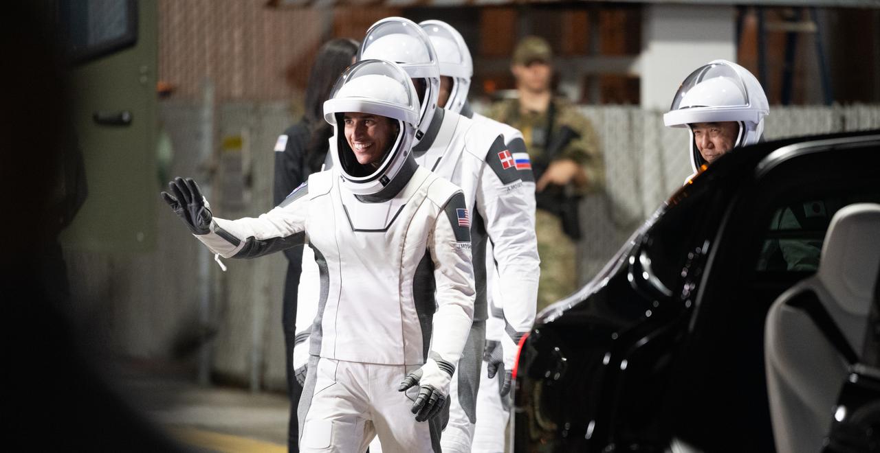 NASA astronaut Jasmin Moghbeli, ESA (European Space Agency) astronaut Andreas Mogensen, Japan Aerospace Exploration Agency (JAXA) astronaut Satoshi Furukawa, and Roscosmos cosmonaut Konstantin Borisov, wearing SpaceX spacesuits, are seen as they prepare to depart the Neil  A. Armstrong Operations and Checkout Building for Launch Complex 39A to board the SpaceX Dragon spacecraft for the Crew-7 mission launch, Saturday, Aug. 26, 2023, at NASA’s Kennedy Space Center in Florida. NASA’s SpaceX Crew-7 mission is the seventh crew rotation mission of the SpaceX Crew Dragon spacecraft and Falcon 9 rocket to the International Space Station as part of the agency’s Commercial Crew Program. Moghbeli, Mogensen, Furukawa, and Borisov are scheduled to launch at 3:27 a.m. EDT, from Launch Complex 39A at the Kennedy Space Center.  Photo Credit: (NASA/Joel Kowsky)