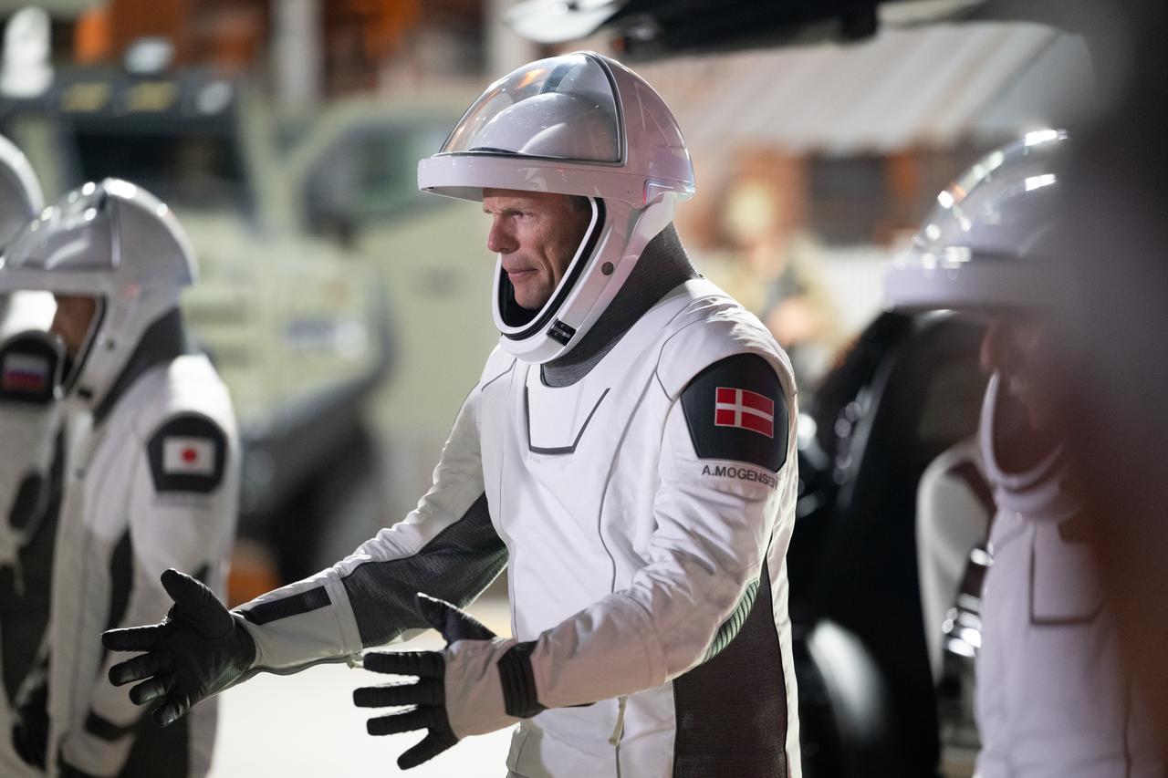 ESA (European Space Agency) astronaut Andreas Mogensen is seen as he and fellow crewmates Japan Aerospace Exploration Agency (JAXA) astronaut Satoshi Furukawa, NASA astronaut Jasmin Moghbeli, and Roscosmos cosmonaut Konstantin Borisov prepare to depart the Neil  A. Armstrong Operations and Checkout Building for Launch Complex 39A to board the SpaceX Dragon spacecraft for the Crew-7 mission launch, Saturday, Aug. 26, 2023, at NASA’s Kennedy Space Center in Florida. NASA’s SpaceX Crew-7 mission is the seventh crew rotation mission of the SpaceX Crew Dragon spacecraft and Falcon 9 rocket to the International Space Station as part of the agency’s Commercial Crew Program. Moghbeli, Mogensen, Furukawa, and Borisov are scheduled to launch at 3:27 a.m. EDT, from Launch Complex 39A at the Kennedy Space Center.  Photo Credit: (NASA/Joel Kowsky)
