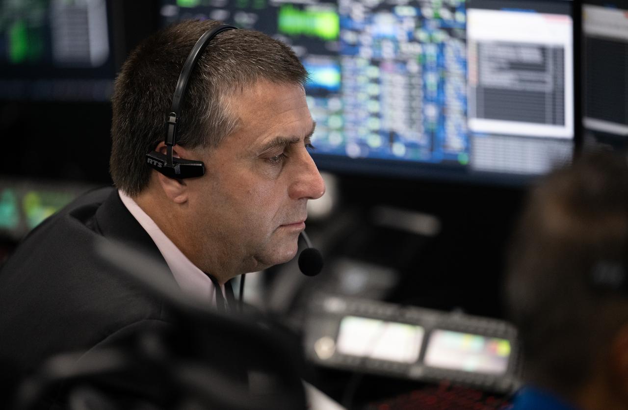 NASA International Space Station program manger Joel Montalbano, monitors the countdown of the launch of a SpaceX Falcon 9 rocket carrying the company's Dragon spacecraft on NASA’s SpaceX Crew-7 mission with NASA astronaut Jasmin Moghbeli, ESA (European Space Agency) astronaut Andreas Mogensen, Japan Aerospace Exploration Agency (JAXA) astronaut Satoshi Furukawa, and Roscosmos cosmonaut Konstantin Borisov onboard, Saturday, Aug. 26, 2023, in SpaceX’s Launch and Landing Control Center in HangerX at NASA’s Kennedy Space Center in Florida. NASA’s SpaceX Crew-7 mission is the first crew rotation mission of the SpaceX Dragon spacecraft and Falcon 9 rocket to the International Space Station as part of the agency’s Commercial Crew Program. Moghbeli, Mogensen, Furukawa, and Borisov launched at 3:27 a.m. EDT from Launch Complex 39A at the Kennedy Space Center. Photo Credit: (NASA/Joel Kowsky)