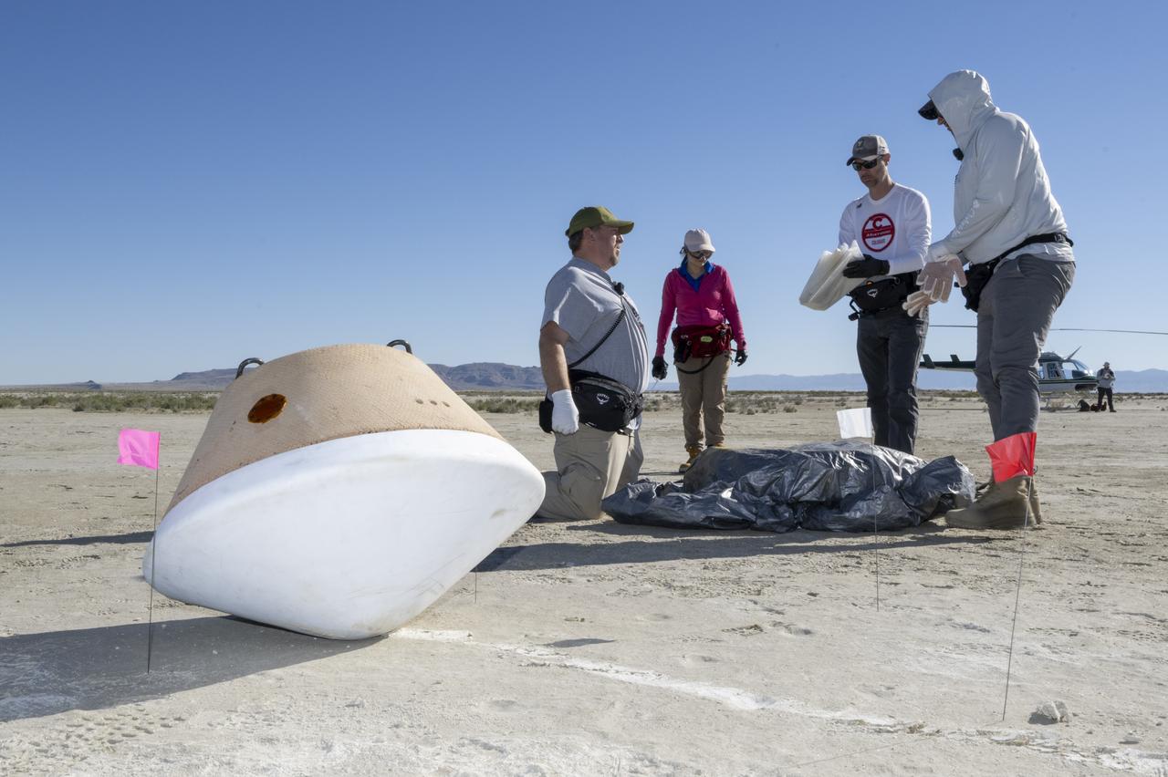 Recovery teams participate in field rehearsals in preparation for the retrieval of the sample return capsule from NASA's OSIRIS-REx mission, Tuesday, Aug. 29, 2023, at the Department of Defense's Utah Test and Training Range. The sample was collected from the asteroid Bennu in October 2020 by NASA’s OSIRIS-REx spacecraft and will return to Earth on September 24th, landing under parachute at the Utah Test and Training Range. Photo Credit: (NASA/Keegan Barber)