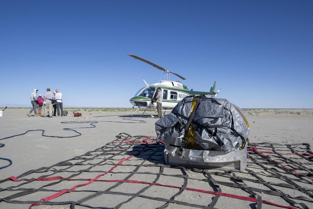 Recovery teams participate in field rehearsals in preparation for the retrieval of the sample return capsule from NASA's OSIRIS-REx mission, Tuesday, Aug. 29, 2023, at the Department of Defense's Utah Test and Training Range. The sample was collected from the asteroid Bennu in October 2020 by NASA’s OSIRIS-REx spacecraft and will return to Earth on September 24th, landing under parachute at the Utah Test and Training Range. Photo Credit: (NASA/Keegan Barber)