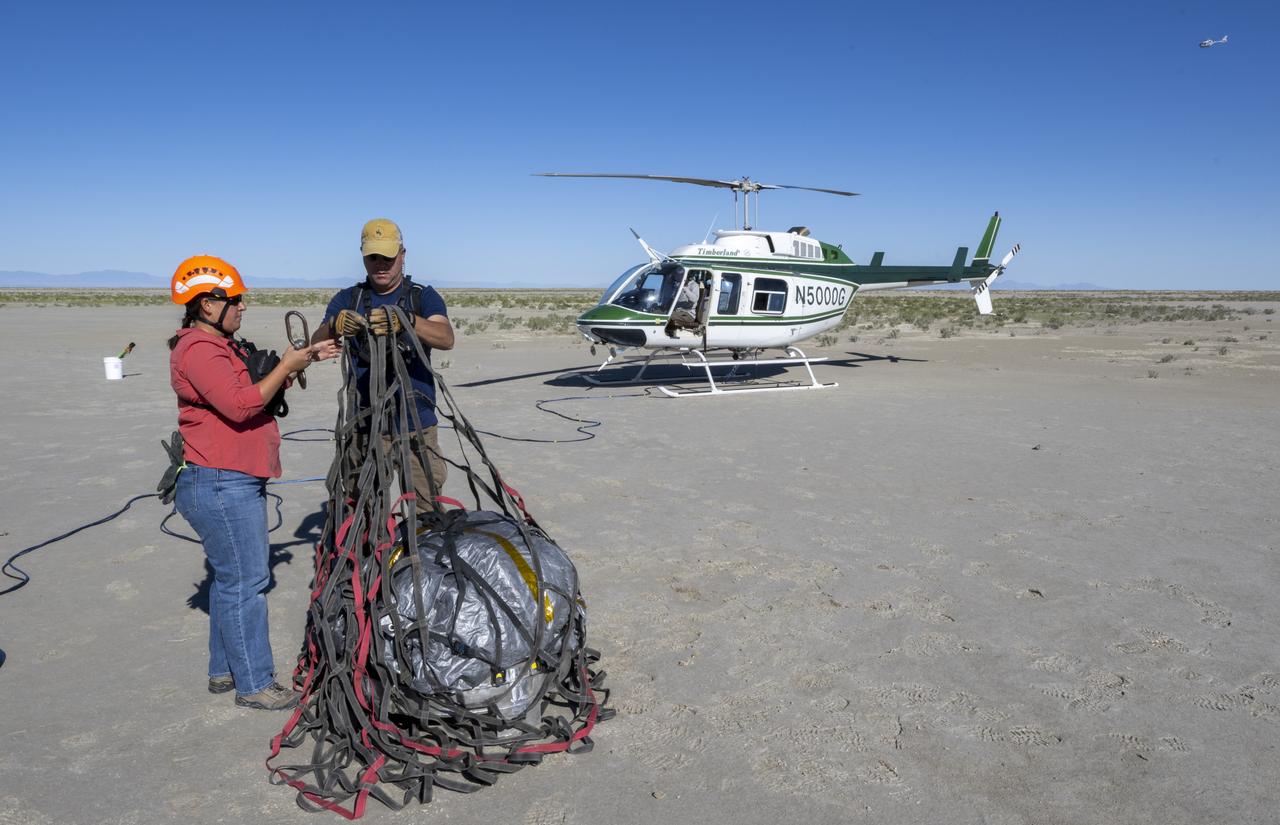 Recovery teams participate in field rehearsals in preparation for the retrieval of the sample return capsule from NASA's OSIRIS-REx mission, Tuesday, Aug. 29, 2023, at the Department of Defense's Utah Test and Training Range. The sample was collected from the asteroid Bennu in October 2020 by NASA’s OSIRIS-REx spacecraft and will return to Earth on September 24th, landing under parachute at the Utah Test and Training Range. Photo Credit: (NASA/Keegan Barber)