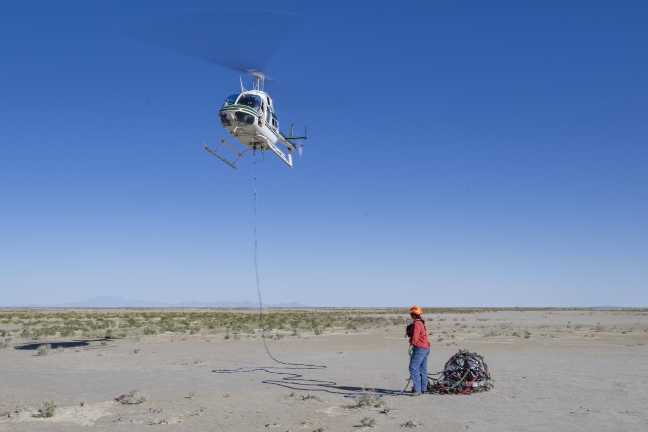 Recovery teams participate in field rehearsals in preparation for the retrieval of the sample return capsule from NASA's OSIRIS-REx mission, Tuesday, Aug. 29, 2023, at the Department of Defense's Utah Test and Training Range. The sample was collected from the asteroid Bennu in October 2020 by NASA’s OSIRIS-REx spacecraft and will return to Earth on September 24th, landing under parachute at the Utah Test and Training Range. Photo Credit: (NASA/Keegan Barber)