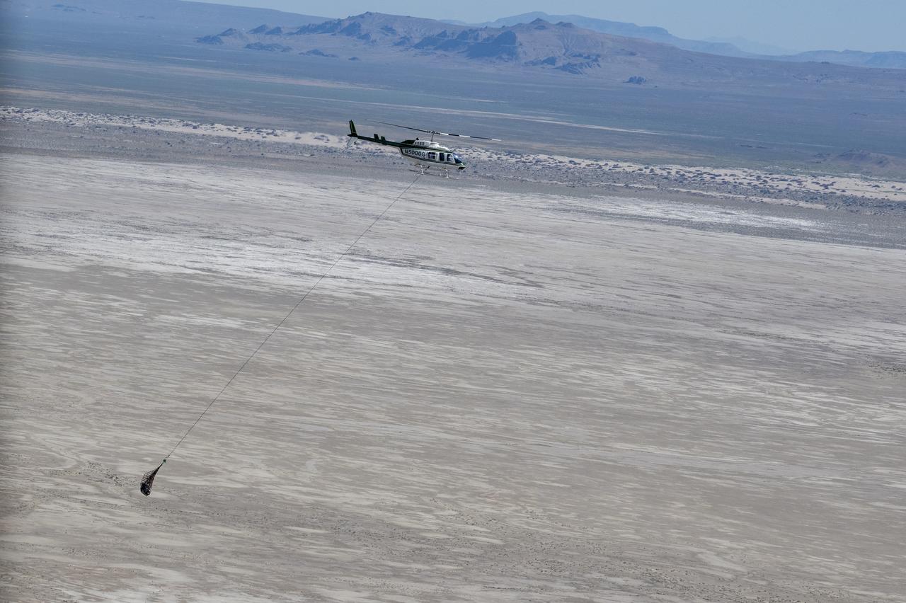 Recovery teams participate in field rehearsals in preparation for the retrieval of the sample return capsule from NASA's OSIRIS-REx mission, Tuesday, Aug. 29, 2023, at the Department of Defense's Utah Test and Training Range. The sample was collected from the asteroid Bennu in October 2020 by NASA’s OSIRIS-REx spacecraft and will return to Earth on September 24th, landing under parachute at the Utah Test and Training Range. Photo Credit: (NASA/Keegan Barber)