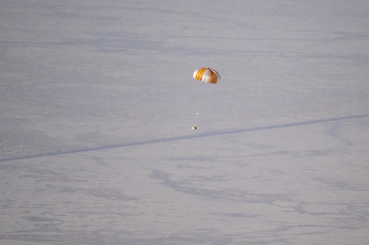 A training model of the sample return capsule is seen during a drop test in preparation for the retrieval of the sample return capsule from NASA's OSIRIS-REx mission, Wednesday, Aug. 30, 2023, at the Department of Defense's Utah Test and Training Range. The sample was collected from the asteroid Bennu in October 2020 by NASA’s OSIRIS-REx spacecraft and will return to Earth on September 24th, landing under parachute at the Utah Test and Training Range. Photo Credit: (NASA/Keegan Barber)