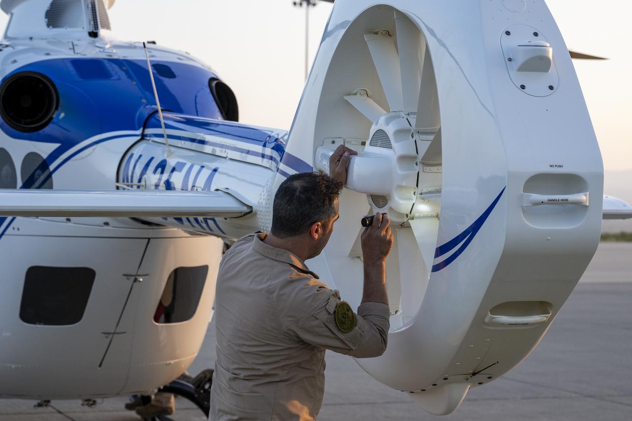 Andre Karpowich, Kennedy Space Center (KSC) Flight Operations, performs preflight checks prior to a drop test in preparation for the retrieval of the sample return capsule from NASA's OSIRIS-REx mission, Wednesday, Aug. 30, 2023, at the Department of Defense's Utah Test and Training Range. The sample was collected from the asteroid Bennu in October 2020 by NASA’s OSIRIS-REx spacecraft and will return to Earth on September 24th, landing under parachute at the Utah Test and Training Range. Photo Credit: (NASA/Keegan Barber)
