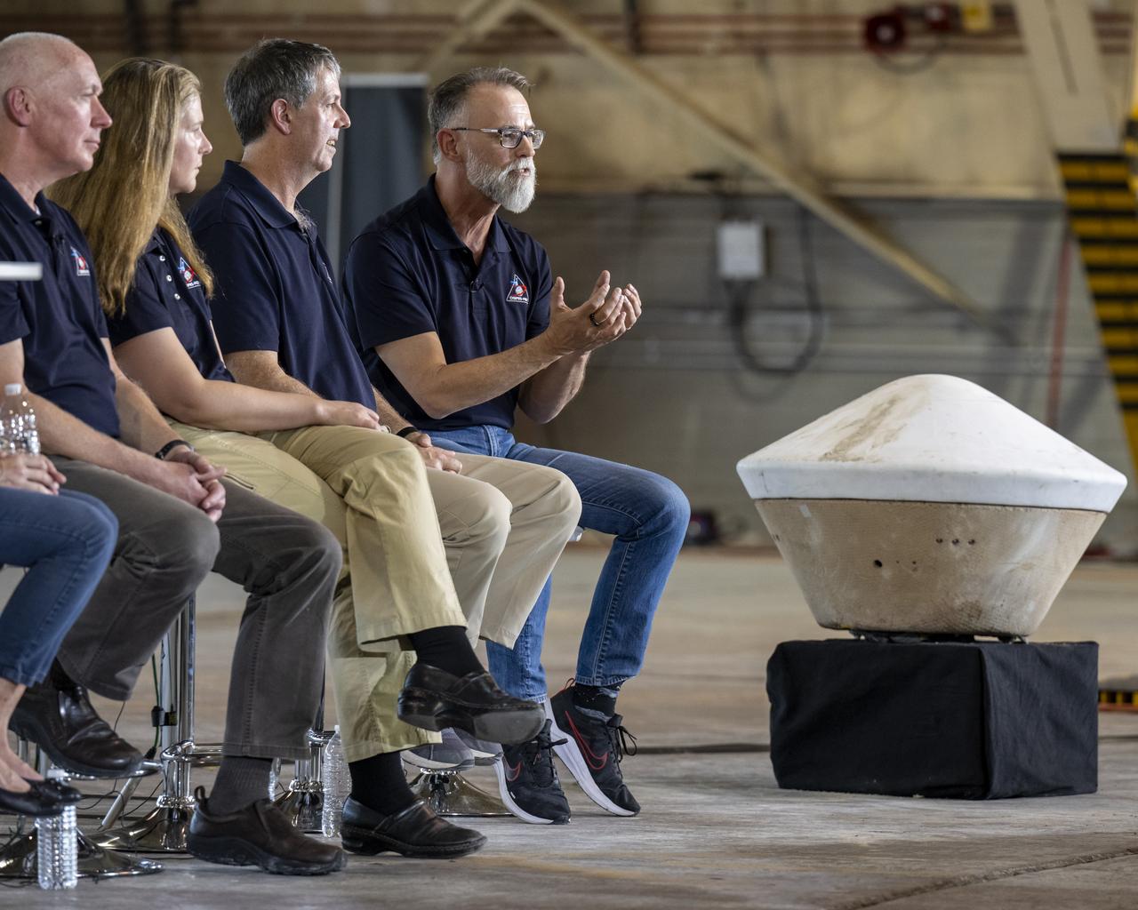 University of Arizona OSIRIS-REx Principal Investigator Dante Lauretta, right, answers questions from reporters during an OSIRIS-REx sample return press conference, Wednesday, Aug. 30, 2023, at the Department of Defense's Utah Test and Training Range. The sample was collected from the asteroid Bennu in October 2020 by NASA’s OSIRIS-REx spacecraft and will return to Earth on September 24th, landing under parachute at the Utah Test and Training Range. Photo Credit: (NASA/Keegan Barber)