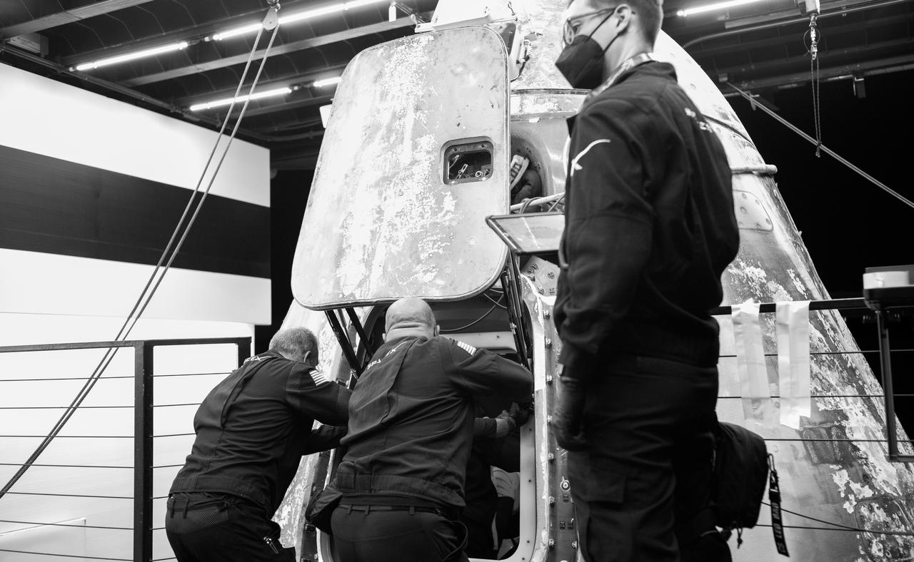 Support teams onboard the SpaceX recovery ship MEGAN work around the SpaceX Dragon Endeavour spacecraft after the hatch was opened shortly after it landed with NASA astronauts Stephen Bowen and Warren "Woody" Hoburg, UAE (United Arab Emirates) astronaut Sultan Alneyadi, and Roscosmos cosmonaut Andrey Fedyaev aboard in the Atlantic Ocean off the coast of Jacksonville, Florida, Monday, Sept. 4, 2023. Bowen, Hoburg, Alneyadi, and Fedyaev are returning after nearly six-months in space as part of Expedition 69 aboard the International Space Station. Photo Credit: (NASA/Joel Kowsky)