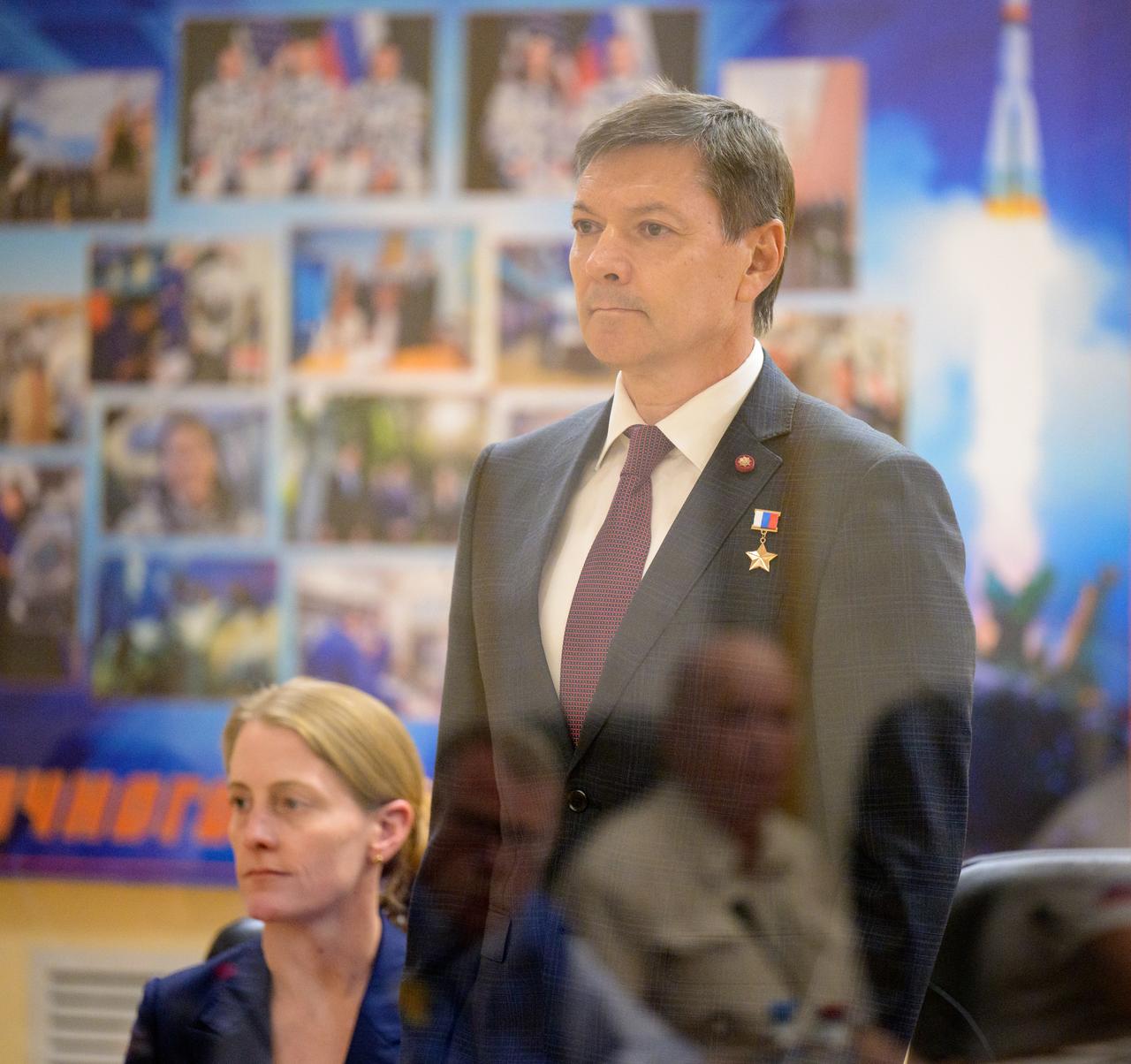 Roscosmos cosmonaut Oleg Kononenko, is seen in quarantine behind glass, during the State Commission meeting to approve the Soyuz launch of Expedition 70 to the international Space Station, Thursday, Sept. 14, 2023 at the Cosmonaut Hotel in Baikonur, Kazakhstan. Expedition 70 NASA astronaut Loral O'Hara, Roscosmos cosmonauts Oleg Kononenko, and Nikolai Chub are scheduled to launch aboard their Soyuz MS-24 spacecraft on Sept. 15. Photo Credit: (NASA/Bill Ingalls)