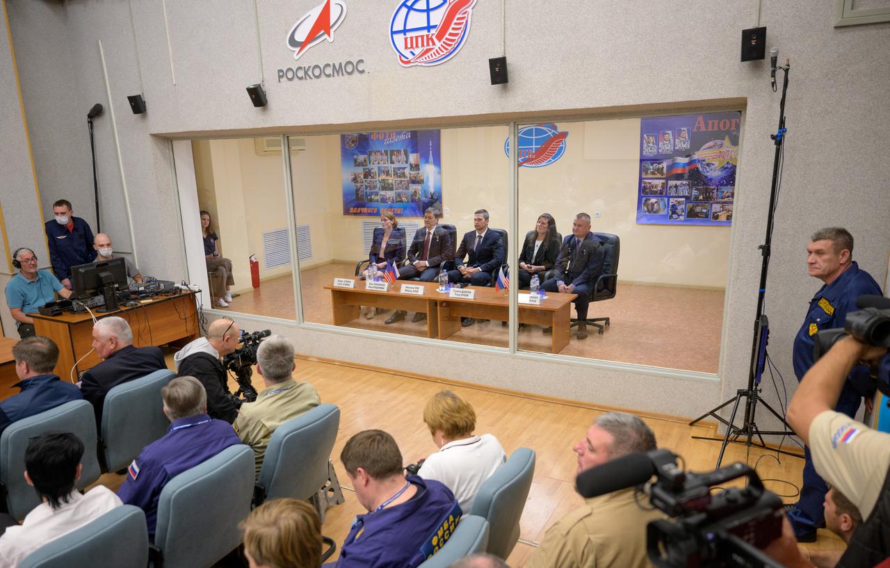 Expedition 70 prime crew NASA astronaut Loral O'Hara, left, Roscosmos cosmonauts Oleg Kononenko, and Nikolai Chub, along with backup crew members Tracy Dyson and Alexey Ovchinin are seen in quarantine behind glass during the State Commission meeting to approve the Soyuz launch of Expedition 70 to the international Space Station, Thursday, Sept. 14, 2023 at the Cosmonaut Hotel in Baikonur, Kazakhstan. Photo Credit: (NASA/Bill Ingalls)