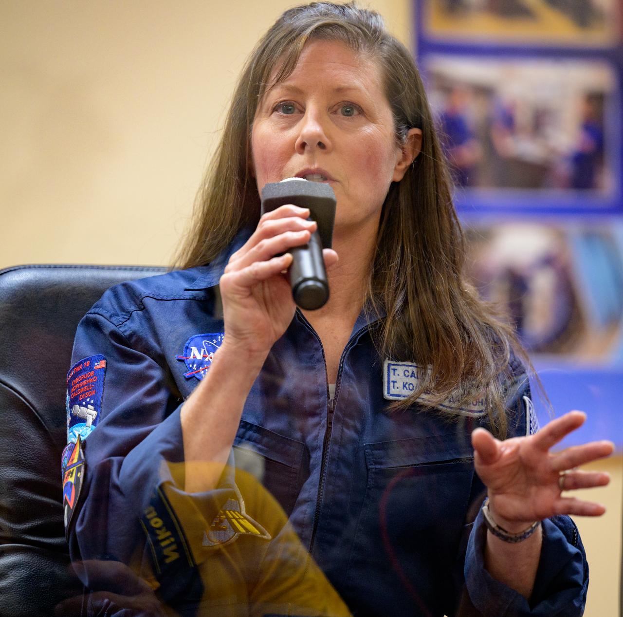 Expedition 70 backup astronaut Tracy Dyson is seen in quarantine behind glass during a press conference, Thursday, Sept. 14, 2023 at the Cosmonaut Hotel in Baikonur, Kazakhstan. Expedition 70 NASA astronaut Loral O'Hara, Roscosmos cosmonauts Oleg Kononenko, and Nikolai Chub are scheduled to launch aboard their Soyuz MS-24 spacecraft on Sept. 15. Photo Credit: (NASA/Bill Ingalls)