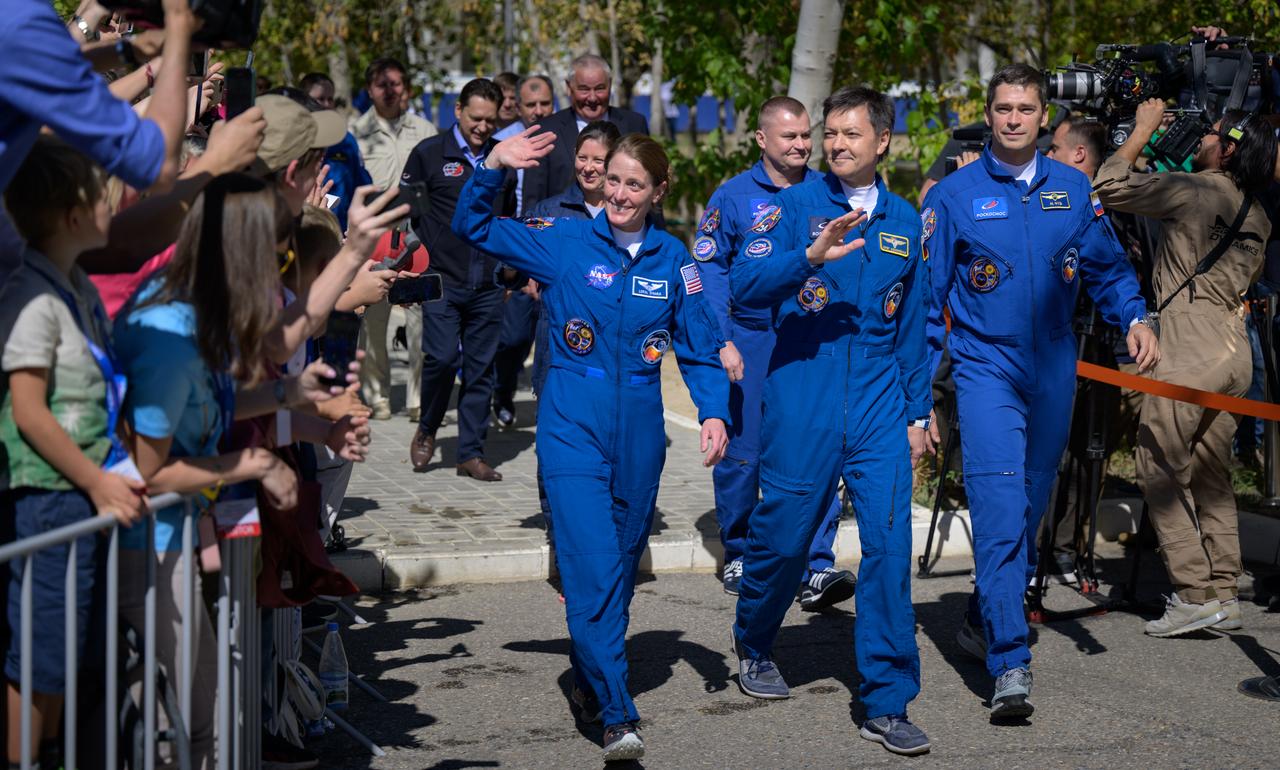 Expedition 70 NASA astronaut Loral O'Hara, left, Roscosmos cosmonauts Oleg Kononenko, center, and Nikolai Chub, along with Expedition 70 backup crewmembers Tracy Dyson of NASA, second row left, and Alexey Ovchinin of Roscosmos, depart the Cosmonaut Hotel to suit-up for their Soyuz launch to the International Space Station, Friday, Sept. 15, 2023, in Baikonur, Kazakhstan. The launch will send Expedition 70 NASA astronaut Loral O'Hara and Roscosmos cosmonauts Oleg Kononenko and Nikolai Chub on a mission to the International Space Station. Photo Credit: (NASA/Bill Ingalls)