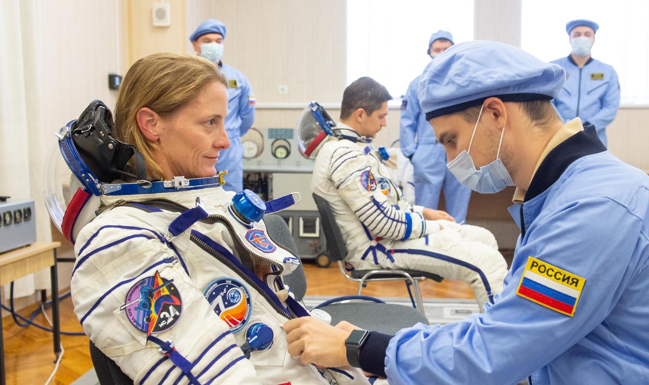 Expedition 70 NASA astronaut Loral O'Hara dons her Russian Sokol suit as she and fellow crewmates, Roscosmos cosmonauts Oleg Kononenko and Nikolai Chub, prepare for their Soyuz launch to the International Space Station, Friday, Sept. 15, 2023 in Baikonur, Kazakhstan. The launch will send Expedition 70 NASA astronaut Loral O'Hara and Roscosmos cosmonauts Oleg Kononenko and Nikolai Chub on a mission to the International Space Station. Photo Credit: (NASA/GCTC/Andrey Shelepin)