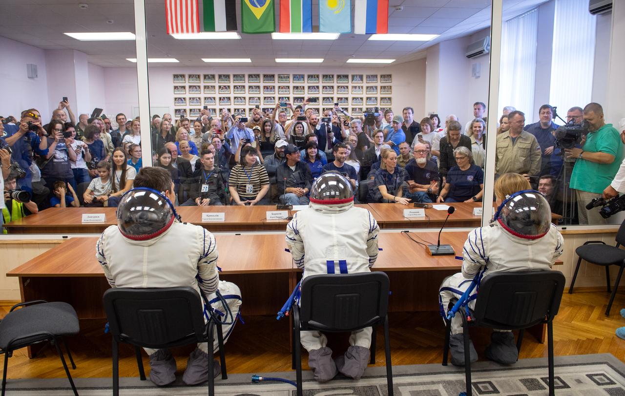 Expedition 70 Roscosmos cosmonauts Nikolai Chub, left, and Oleg Kononenko, center, along with NASA astronaut Loral O'Hara, visit with families shortly before departing for their Soyuz launch to the International Space Station, Friday, Sept. 15, 2023 in Baikonur, Kazakhstan. The launch will send Expedition 70 NASA astronaut Loral O'Hara and Roscosmos cosmonauts Oleg Kononenko and Nikolai Chub on a mission to the International Space Station. Photo Credit: (NASA/GCTC/Andrey Shelepin)