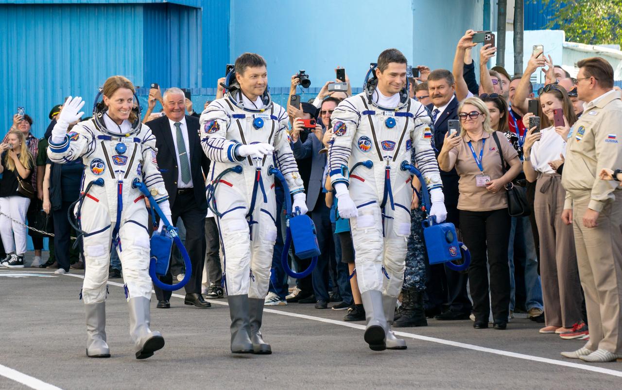 Expedition 70 NASA astronaut Loral O'Hara, left, and Roscosmos cosmonauts Oleg Kononenko, center, and Nikolai Chub, depart building 254 for their Soyuz launch to the International Space Station Friday, Sept. 15, 2023 in Baikonur, Kazakhstan. The launch will send Expedition 70 NASA astronaut Loral O'Hara and Roscosmos cosmonauts Oleg Kononenko and Nikolai Chub on a mission to the International Space Station. Photo Credit: (NASA/Victor Zelentsov)