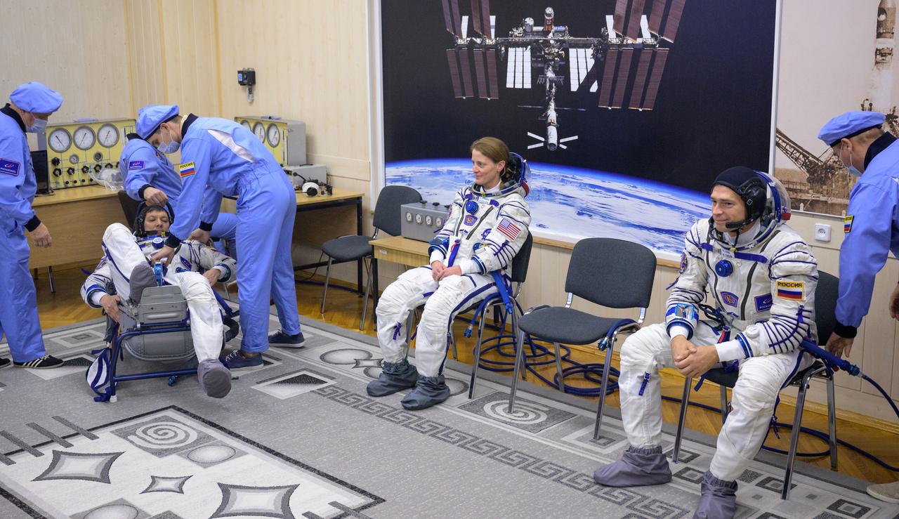 Expedition 70 Roscosmos cosmonaut Oleg Kononenko, left, NASA astronaut Loral O'Hara, center, and Roscosmos cosmonaut Nikolai Chub, have their Russian Sokol Suits pressure checked ahead of their Soyuz launch to the International Space Station Friday, Sept. 15, 2023 in Baikonur, Kazakhstan. The launch will send Expedition 70 NASA astronaut Loral O'Hara and Roscosmos cosmonauts Oleg Kononenko and Nikolai Chub on a mission to the International Space Station. Photo Credit: (NASA/Bill Ingalls)