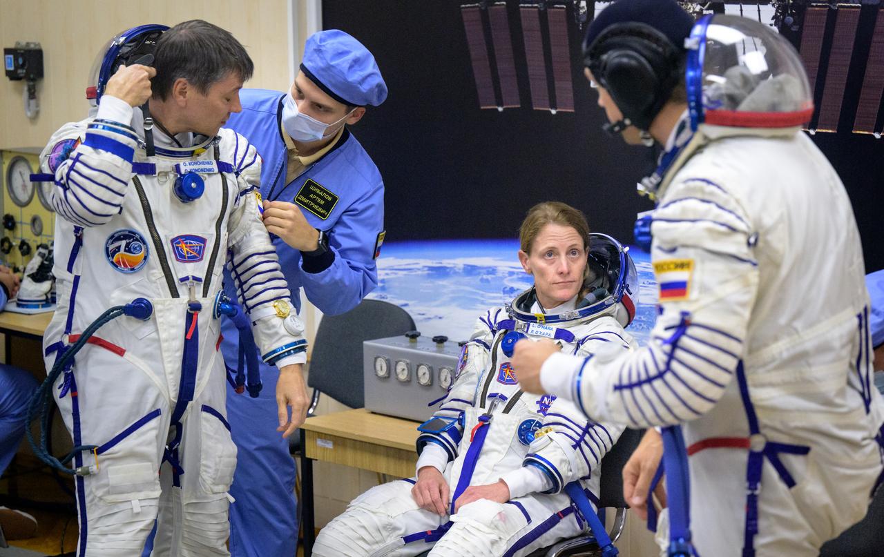 Expedition 70 Roscosmos cosmonaut Oleg Kononenko, left, NASA astronaut Loral O'Hara, center, and Roscosmos cosmonaut Nikolai Chub, have their Russian Sokol Suits pressure checked ahead of their Soyuz launch to the International Space Station Friday, Sept. 15, 2023 in Baikonur, Kazakhstan. The launch will send Expedition 70 NASA astronaut Loral O'Hara and Roscosmos cosmonauts Oleg Kononenko and Nikolai Chub on a mission to the International Space Station. Photo Credit: (NASA/Bill Ingalls)