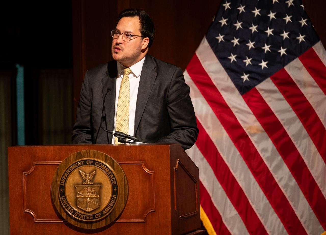 Andrés Chong-Qui Torres, director of the Office of Faith-Based and Neighborhood Partnerships at the Department of Commerce, delivers remarks at the 2023 National Youth Summit hosted by the U.S. Department of Commerce’s Office of Faith-Based and Neighborhood Partnerships, Thursday, Sept. 21, 2023, at the U.S. Department of Commerce in Washington.  Photo Credit: (NASA/Joel Kowsky)