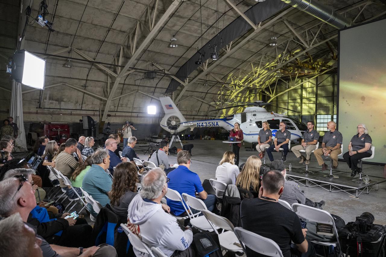 NASA Office of Communications Senior Science Communications Officer Karen Fox introduces, from left to right, NASA Planetary Science Division Director Lori Glaze, University of Arizona OSIRIS-REx Principal Investigator Dante Lauretta, NASA OSIRIS-REx Deputy Project Manager Mike Moreau, Lockheed Martin Deep Space Exploration Chief Engineer Tim Priser, and NASA Chief Scientist Eileen Stansbery during an OSIRIS-REx sample return press conference, Sunday, Sept. 24, 2023, shortly after the capsule landed at the Department of Defense's Utah Test and Training Range. The sample was collected from the asteroid Bennu in October 2020 by NASA’s OSIRIS-REx spacecraft. Photo Credit: (NASA/Keegan Barber)