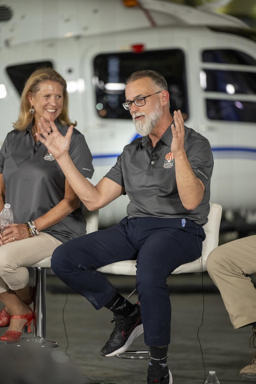 University of Arizona OSIRIS-REx Principal Investigator Dante Lauretta, right, answers questions from reporters during an OSIRIS-REx sample return press conference, Sunday, Sept. 24, 2023, shortly after the capsule landed at the Department of Defense's Utah Test and Training Range. The sample was collected from the asteroid Bennu in October 2020 by NASA’s OSIRIS-REx spacecraft. Photo Credit: (NASA/Keegan Barber)