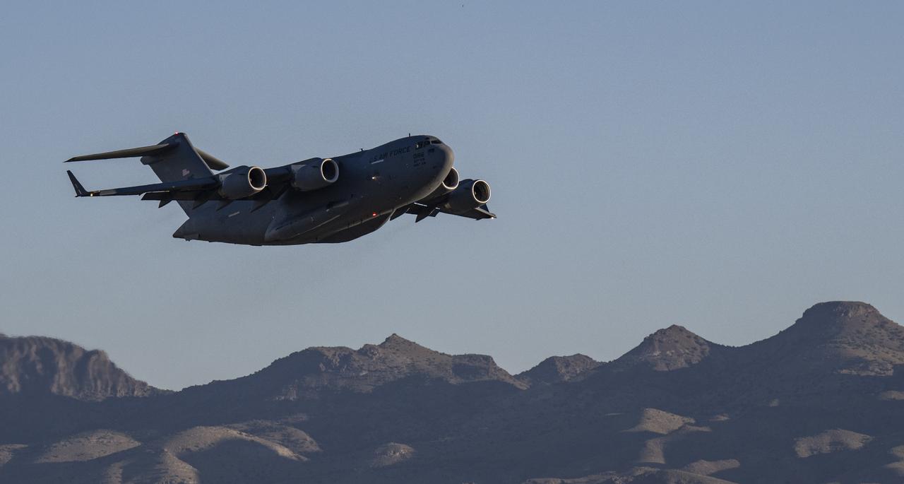 A C-17 Globemaster aircraft with the science canister from NASA’s OSIRIS-REx mission aboard takes off from Michael Army Air Field at the Department of Defense's Utah Test and Training Range, Monday, Sept. 25, 2023, en route to NASA’s Johnson Space Center in Houston, Texas. The sample was collected from the asteroid Bennu in October 2020 by NASA’s OSIRIS-REx spacecraft. Photo Credit: (NASA/Keegan Barber)